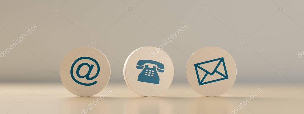 Teléfono y ordenador sobre una mesa de trabajo